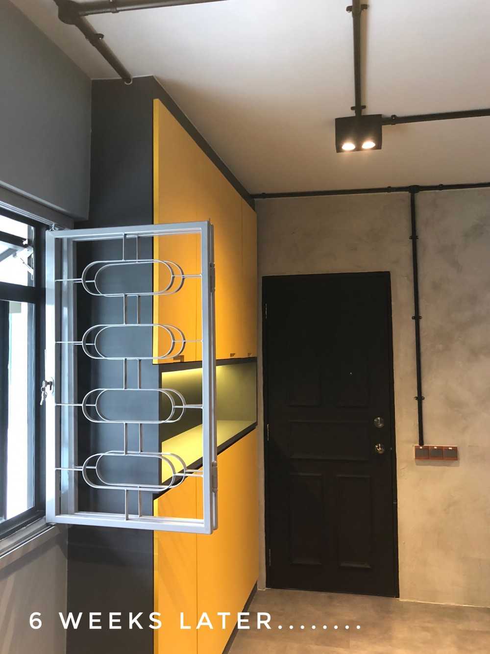 Industrial Entryway with Window Grille and Shoe Rack