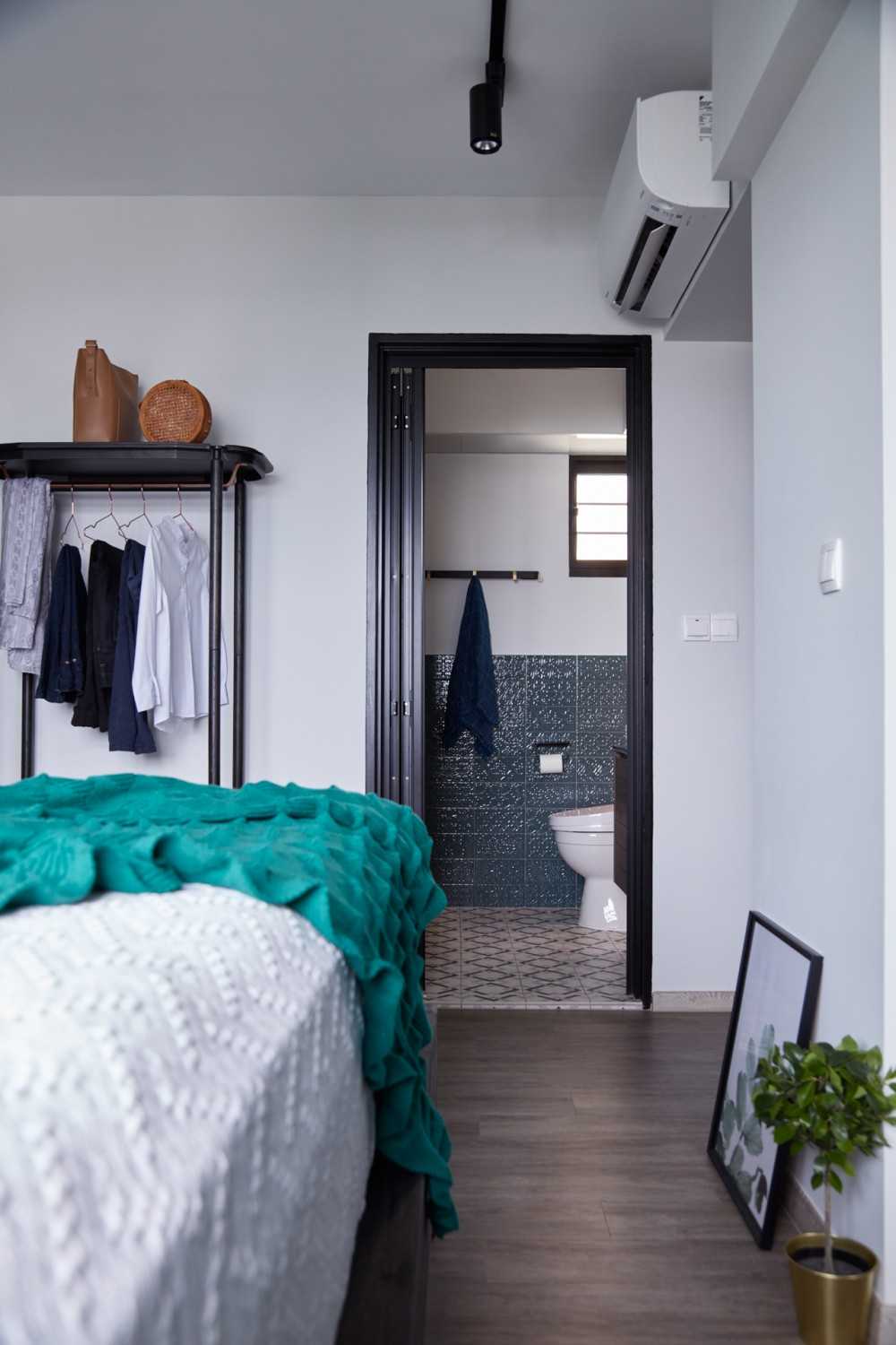 Vintage Bedroom with Queen Bed and Coat Rack
