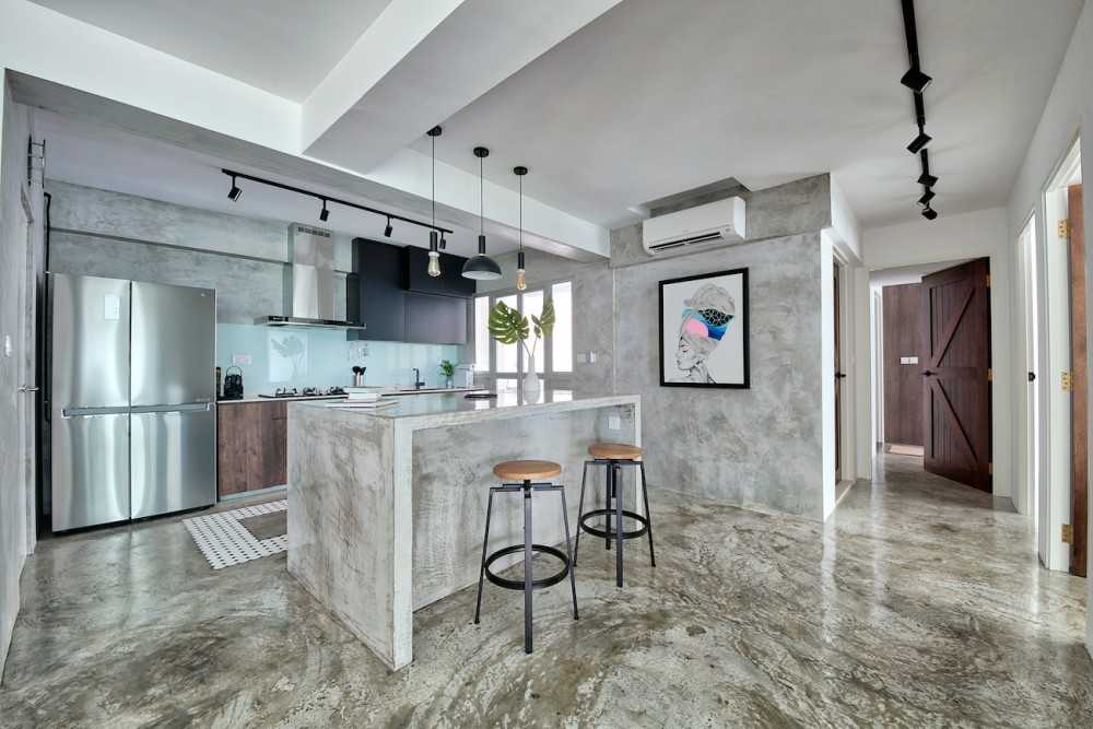 Industrial Kitchen with Cement Floor and Feature Wall
