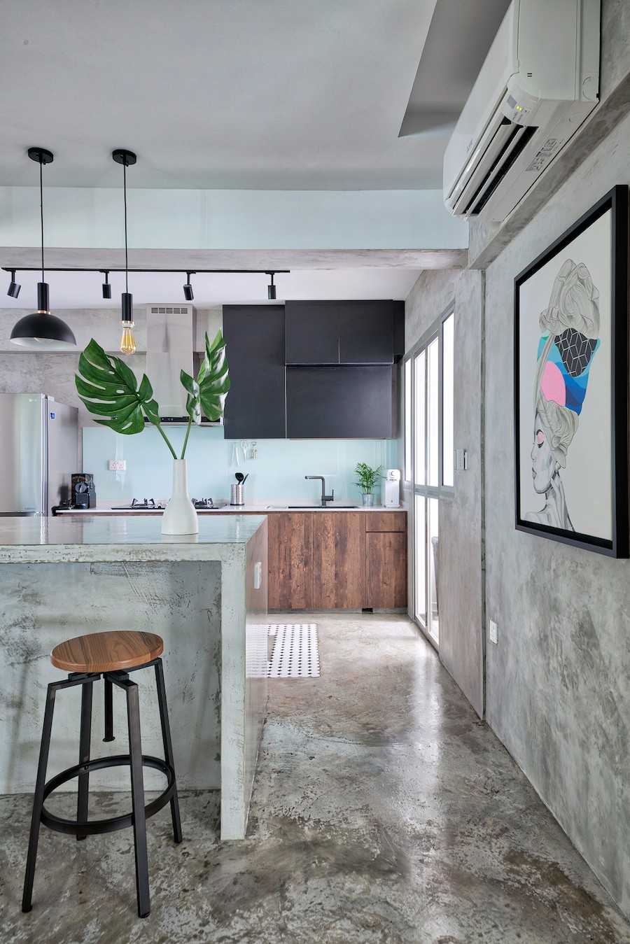 Industrial Kitchen with Cement Floor and Bar Counter