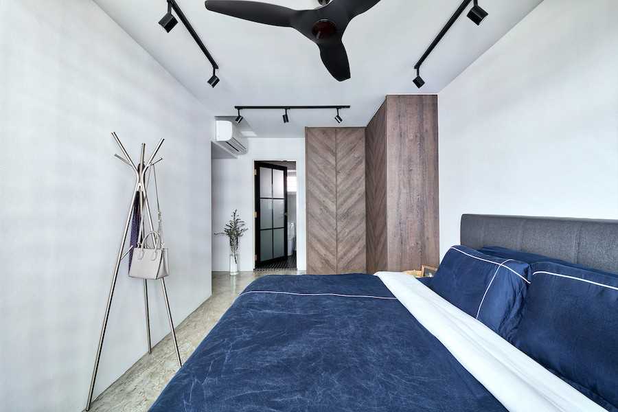 Industrial Bedroom with Wardrobe and Ceiling Fan