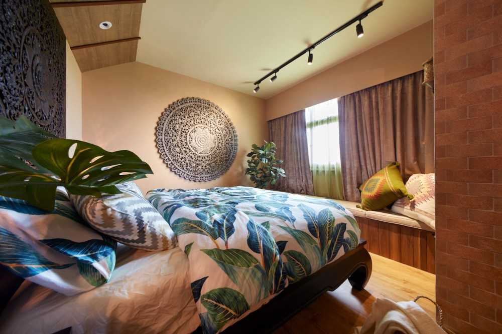 Country Bedroom with Wood Flooring and Bay Window
