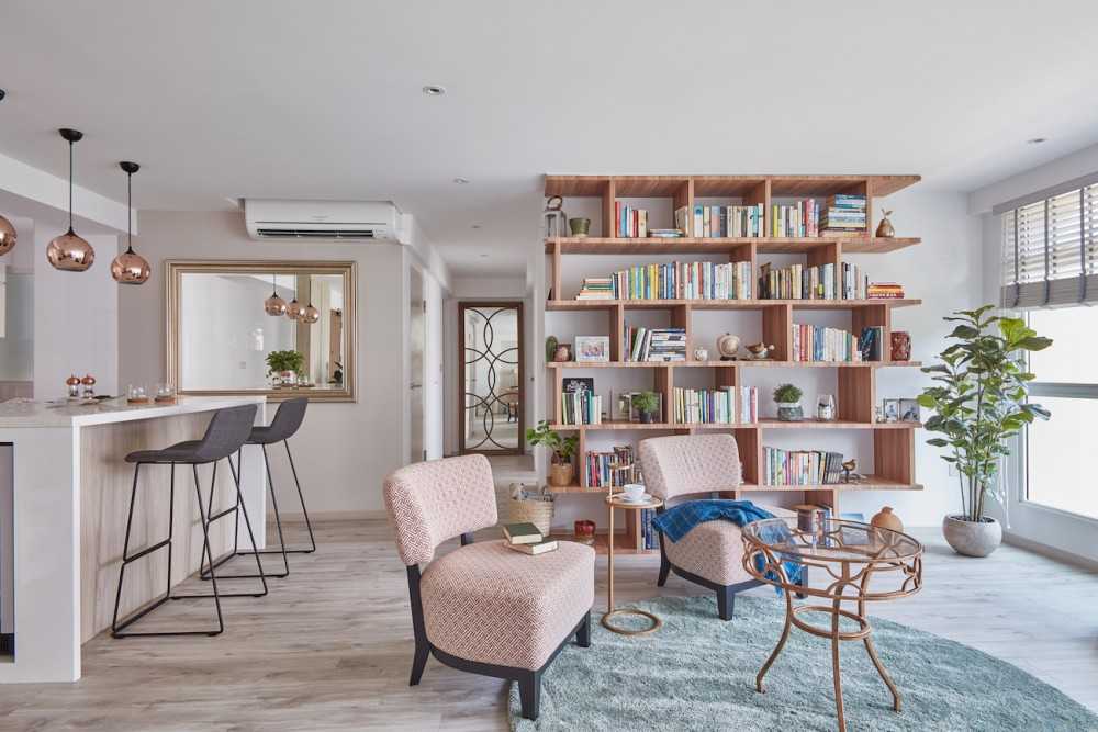 Scandinavian Living Room with Bookshelf and Armchairs