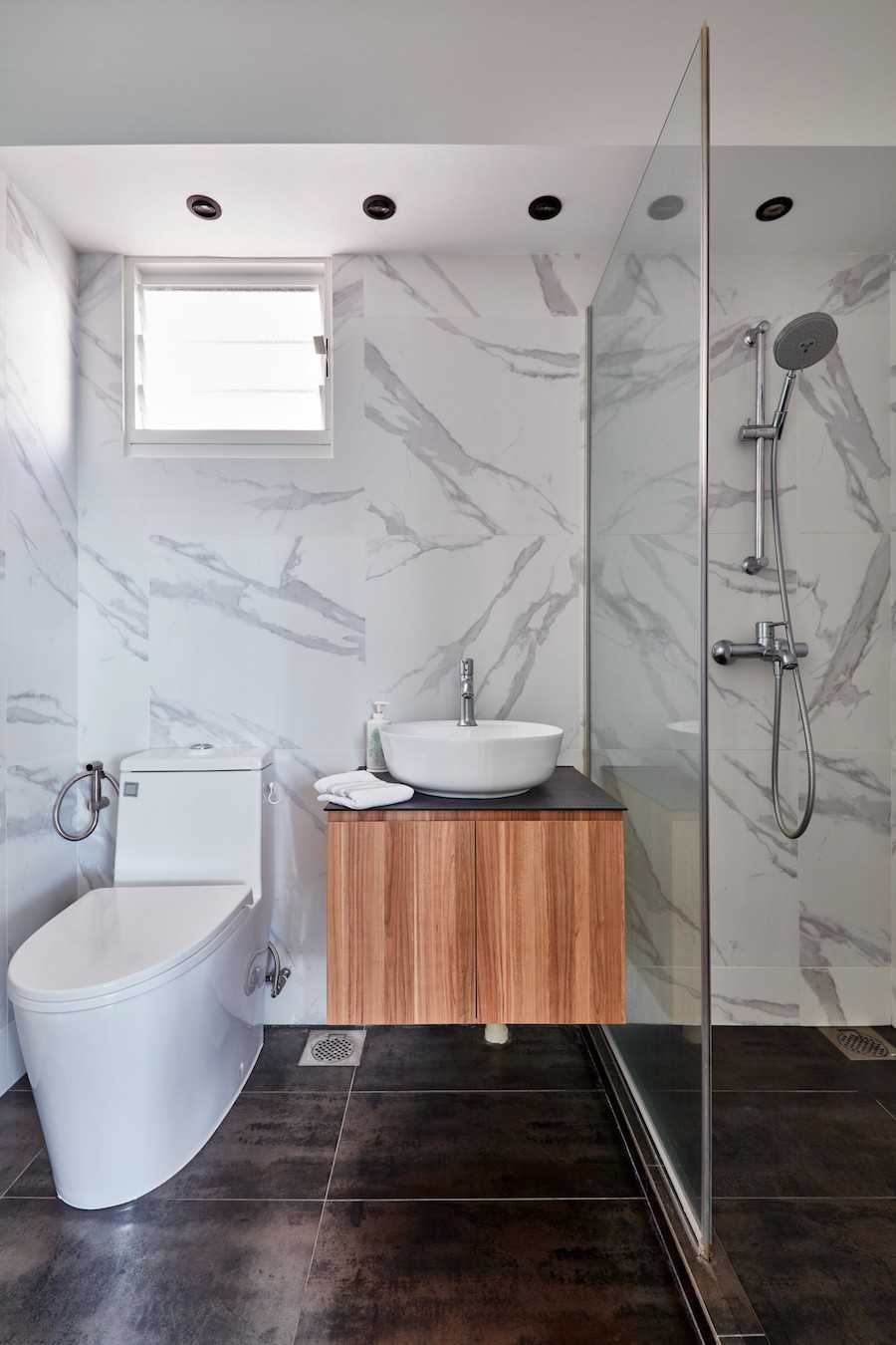 Scandinavian Bathroom with Bathroom Sinks and Showers