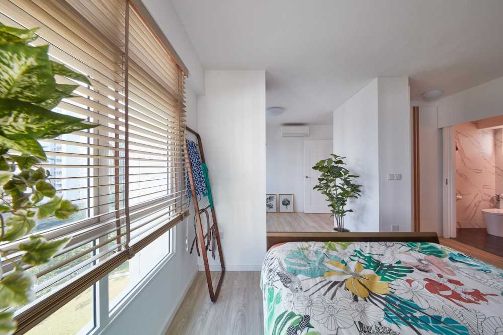 Scandinavian Bedroom with Queen Bed and Coat Rack
