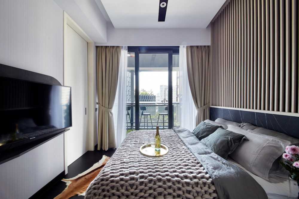 Modern Bedroom with TV and Queen Bed