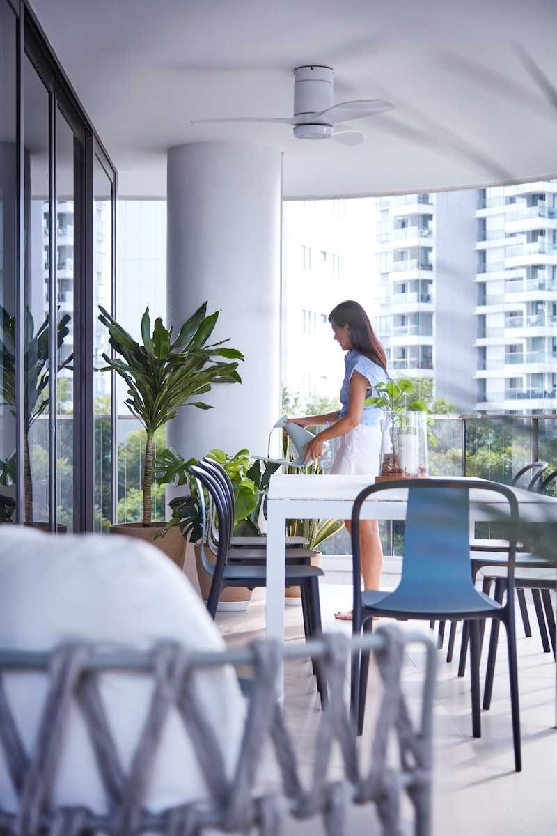 Modern Balcony with Outdoor Chairs and Planters