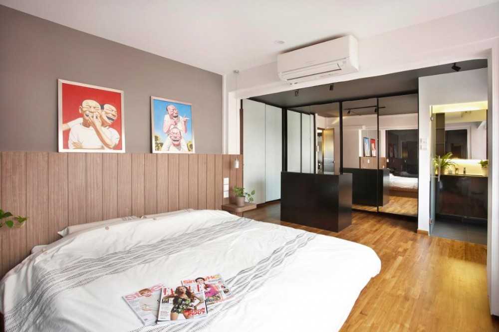 Contemporary Bedroom with Wood Flooring and Artwork