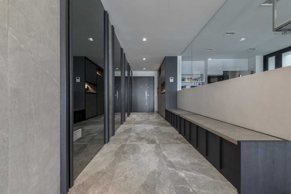 Contemporary Foyer with Settee and Feature Wall