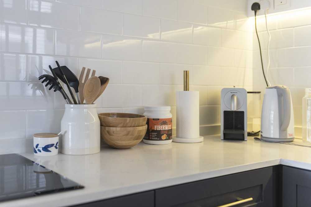 Scandinavian Kitchen with Countertop and Homogeneous Tiles