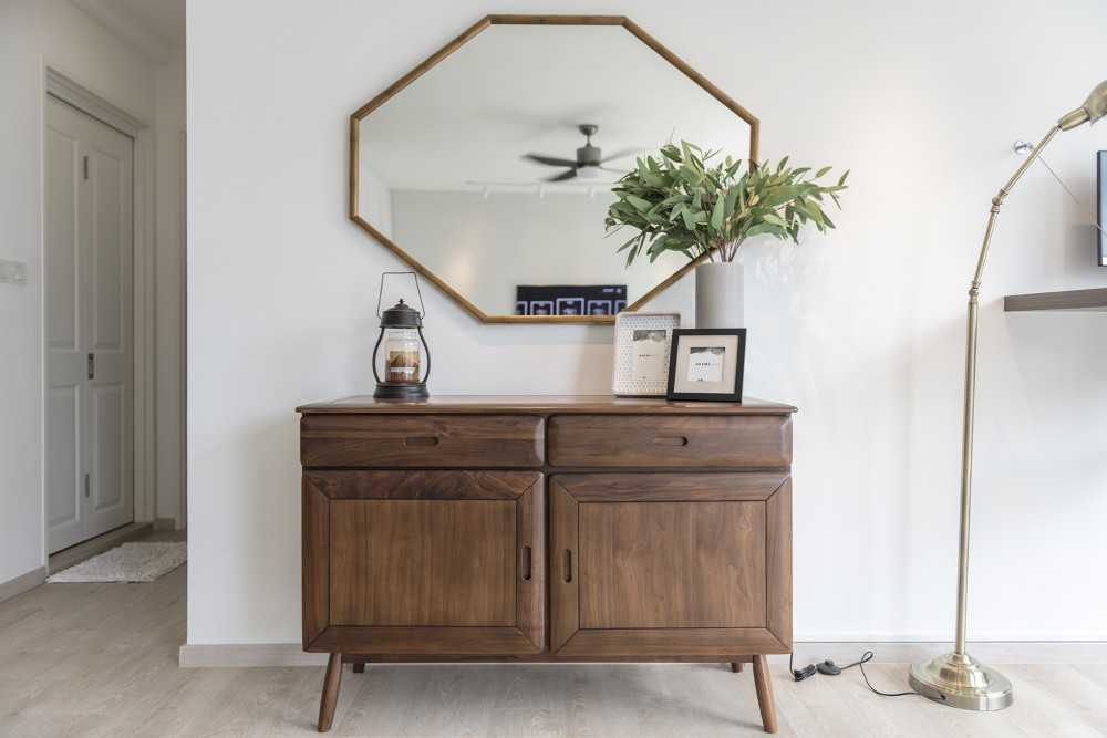 Scandinavian Living Room with Mirror and Storage Cabinets