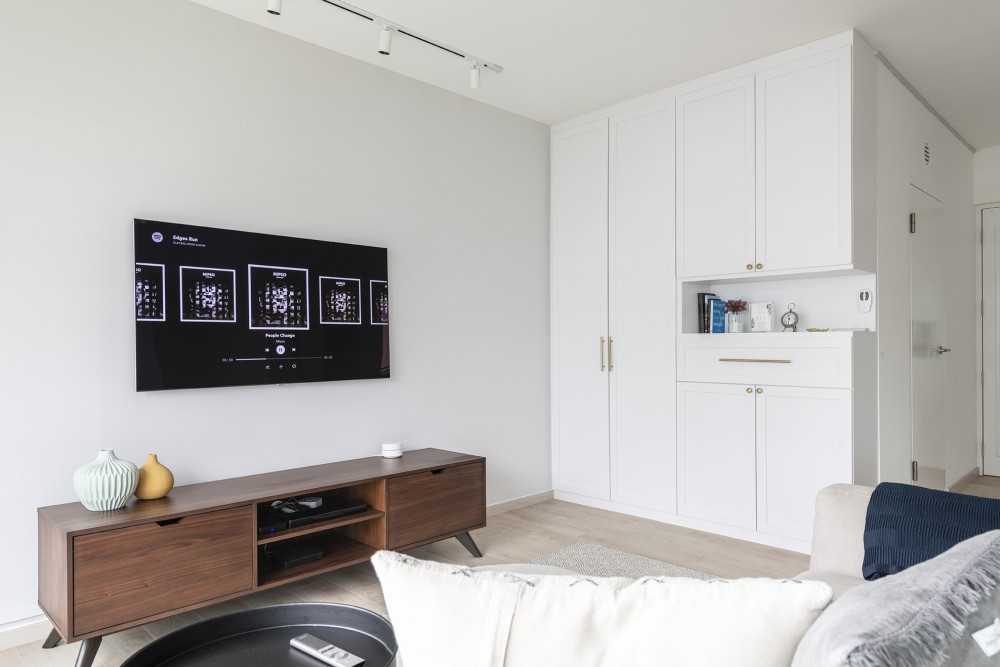 Scandinavian Living Room with TV Console and Wallpaper