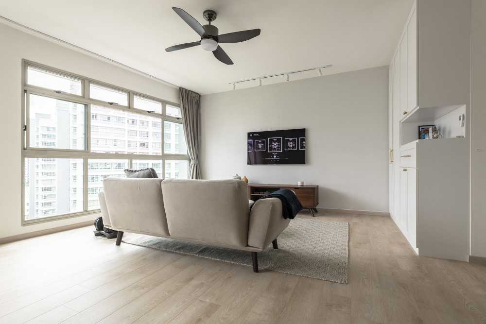 Scandinavian Living Room with TV Console and Ceiling Fan