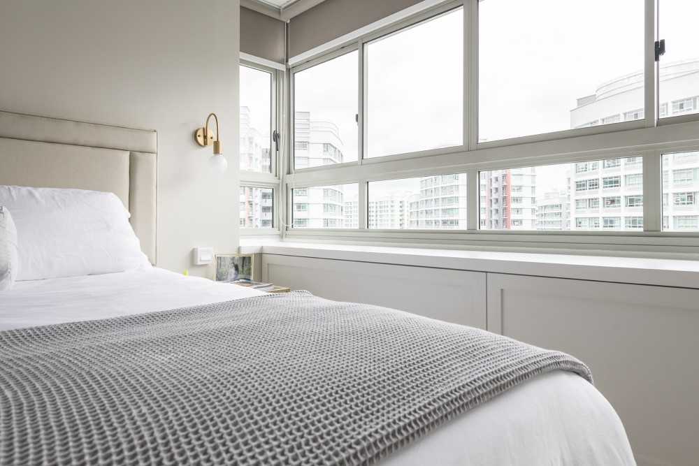 Scandinavian Bedroom with Bay Window and Lighting