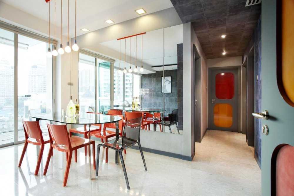 Eclectic Dining Room with Drop Light and Mirror