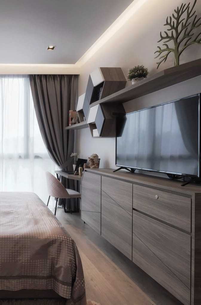 Modern Bedroom with Wood Flooring and Drop Light