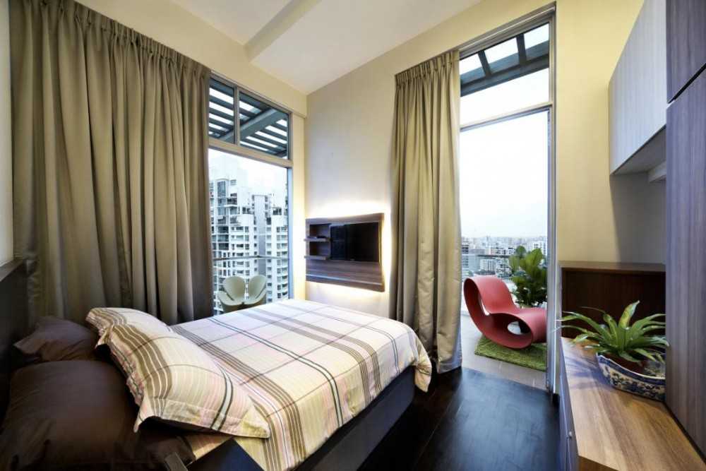 Eclectic Bedroom with Curtain and TV