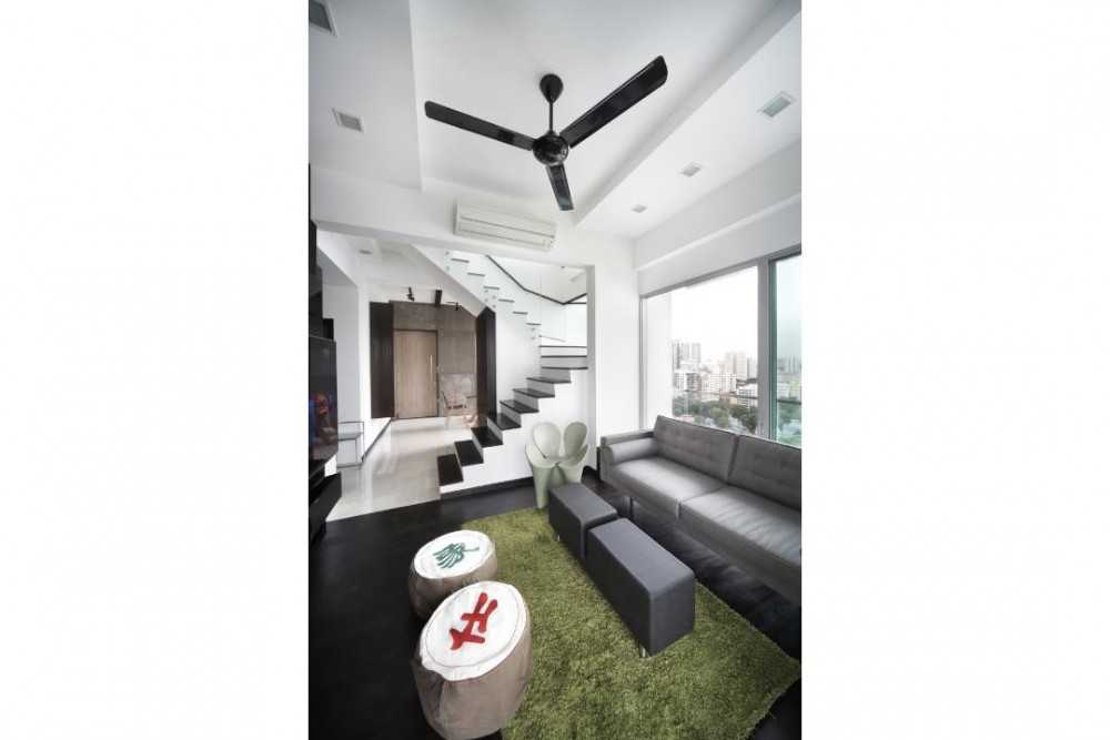 Eclectic Living Room with Staircase and Sofa