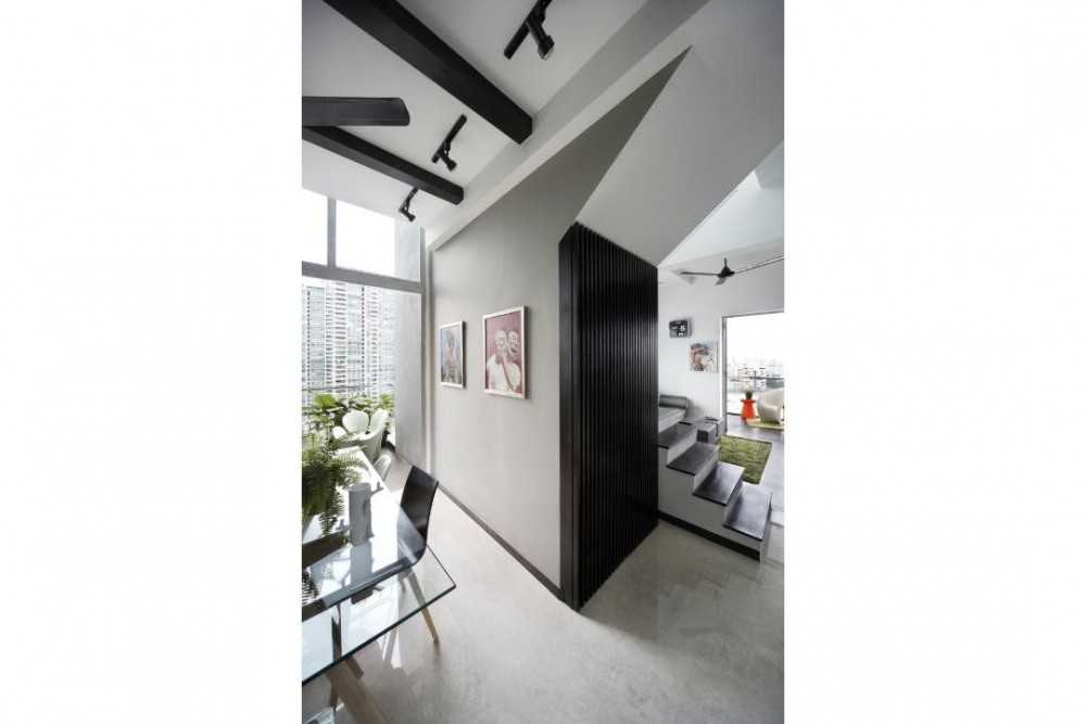 Eclectic Hallway with Staircase and Artwork