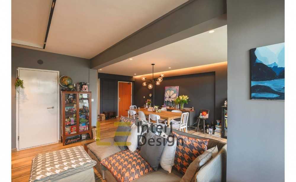 Eclectic Living Room with Bookshelf and Drop Light