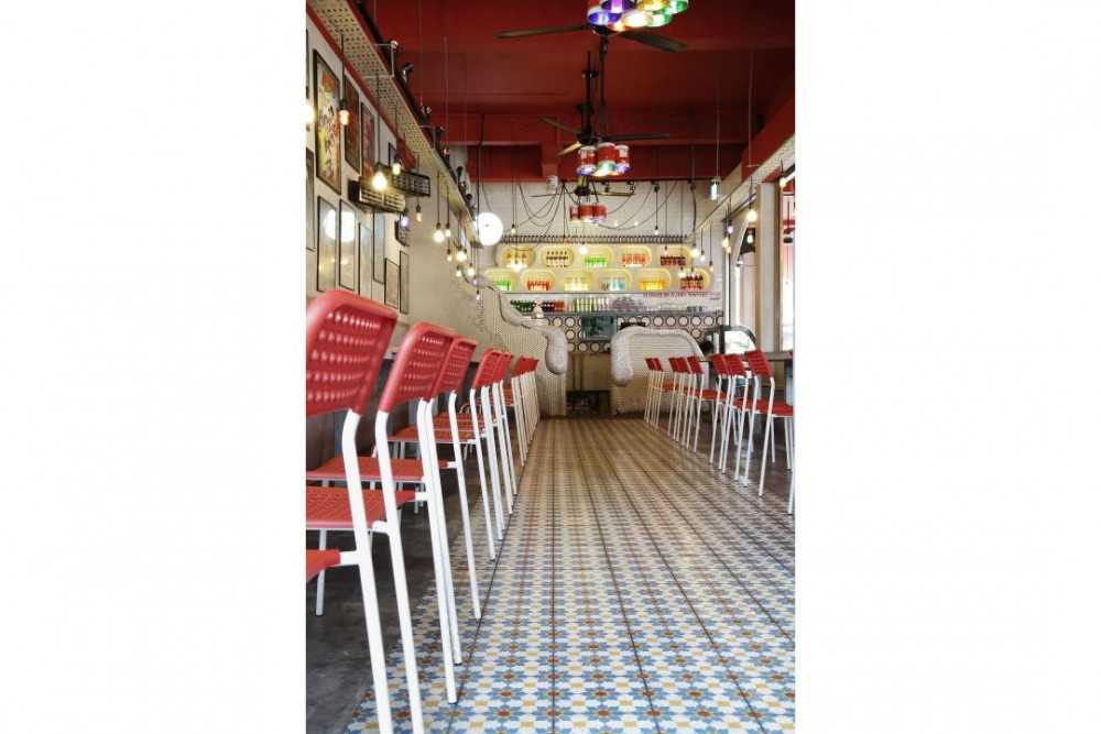 Vintage Restaurant with Drop Light and Dining Chairs