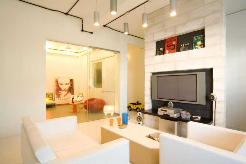 Eclectic Living Room with Feature Wall and Sofa