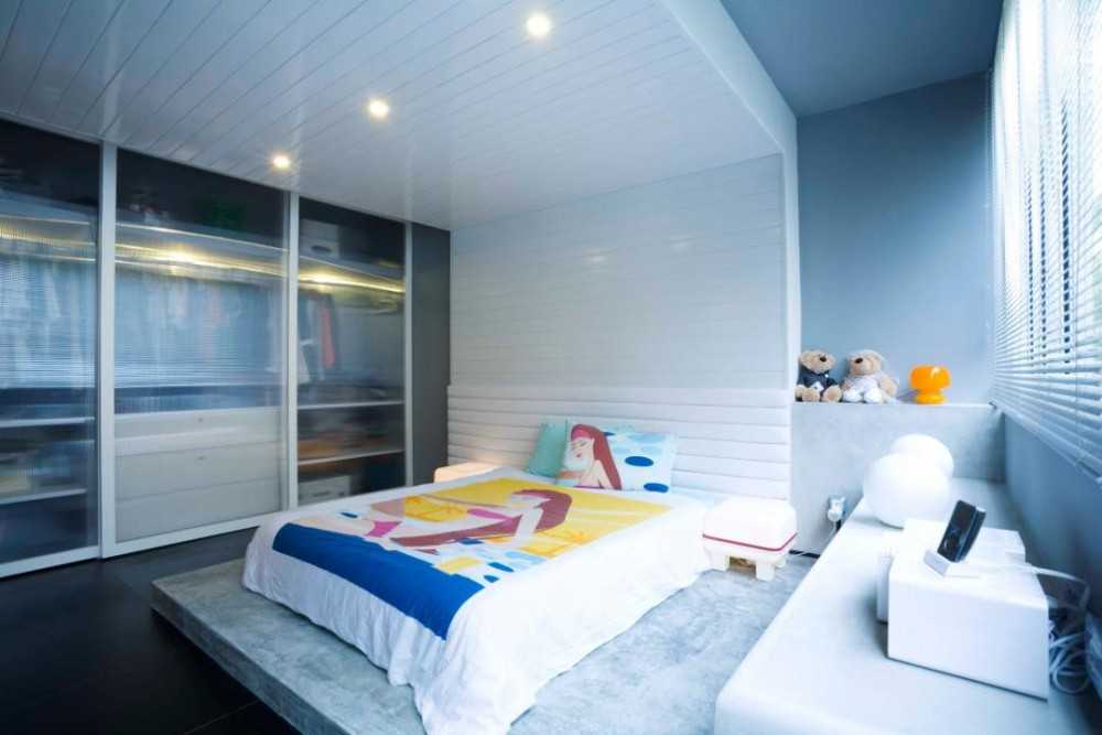 Eclectic Bedroom with Platform Bed and Wardrobe