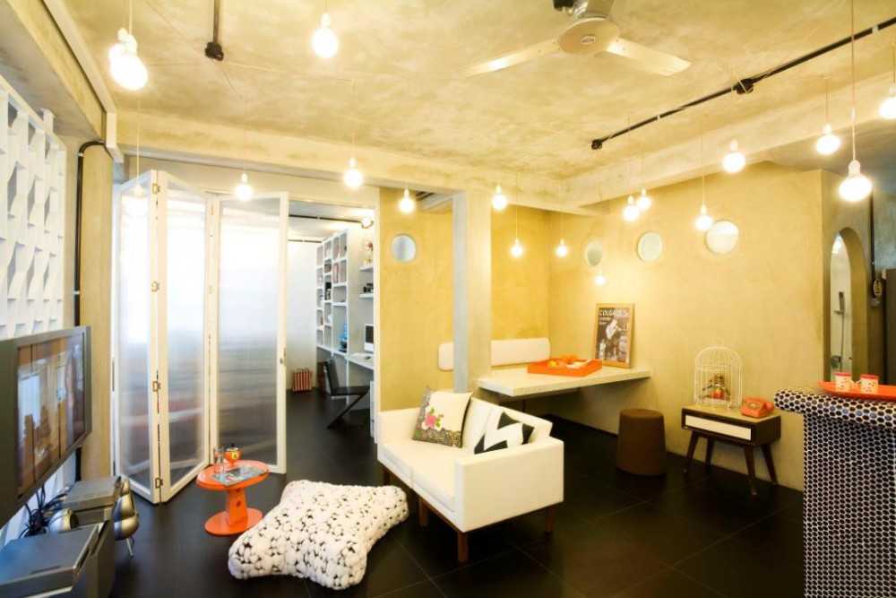 Eclectic Living Room with Drop Light and Room Divider