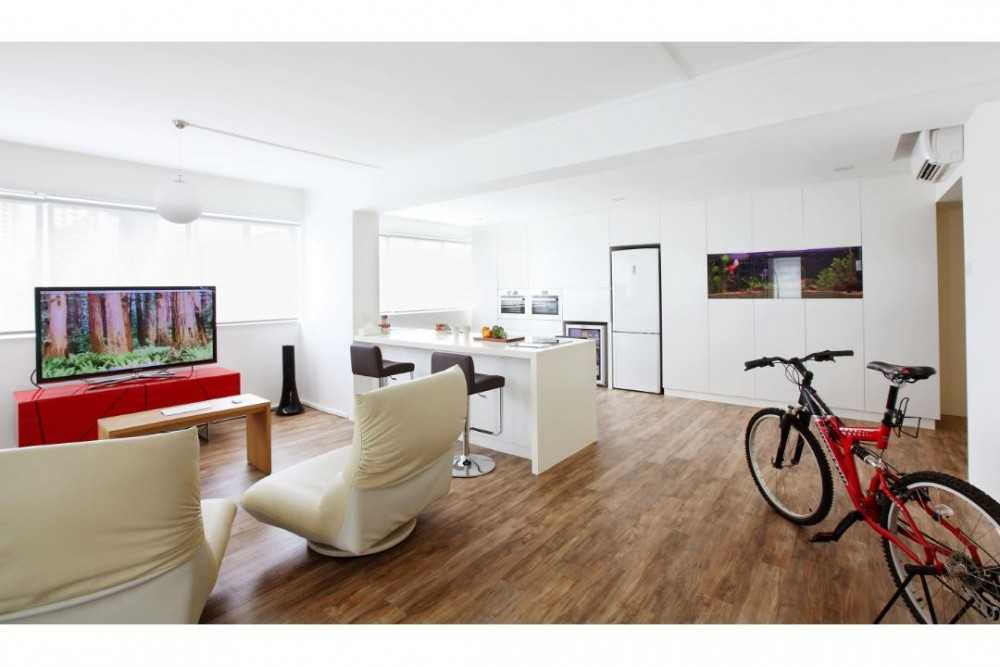 Modern Living Room with Wood Flooring and Armchairs