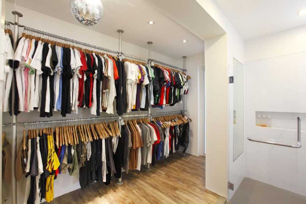Modern Walk-in Wardrobe with Clothes Storage and Lighting