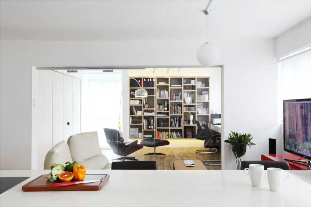 Modern Kitchen with Bar Counter and Bookcases