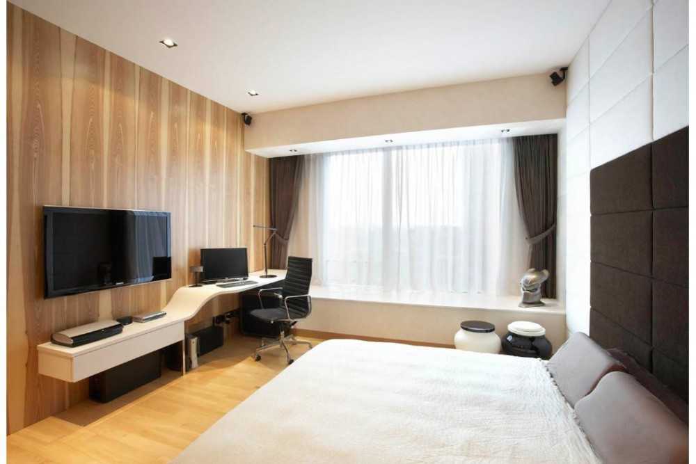 Modern Bedroom with Wood Flooring and Feature Wall