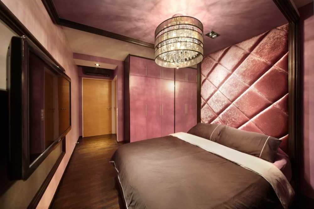 Eclectic Bedroom with Feature Wall and Chandelier