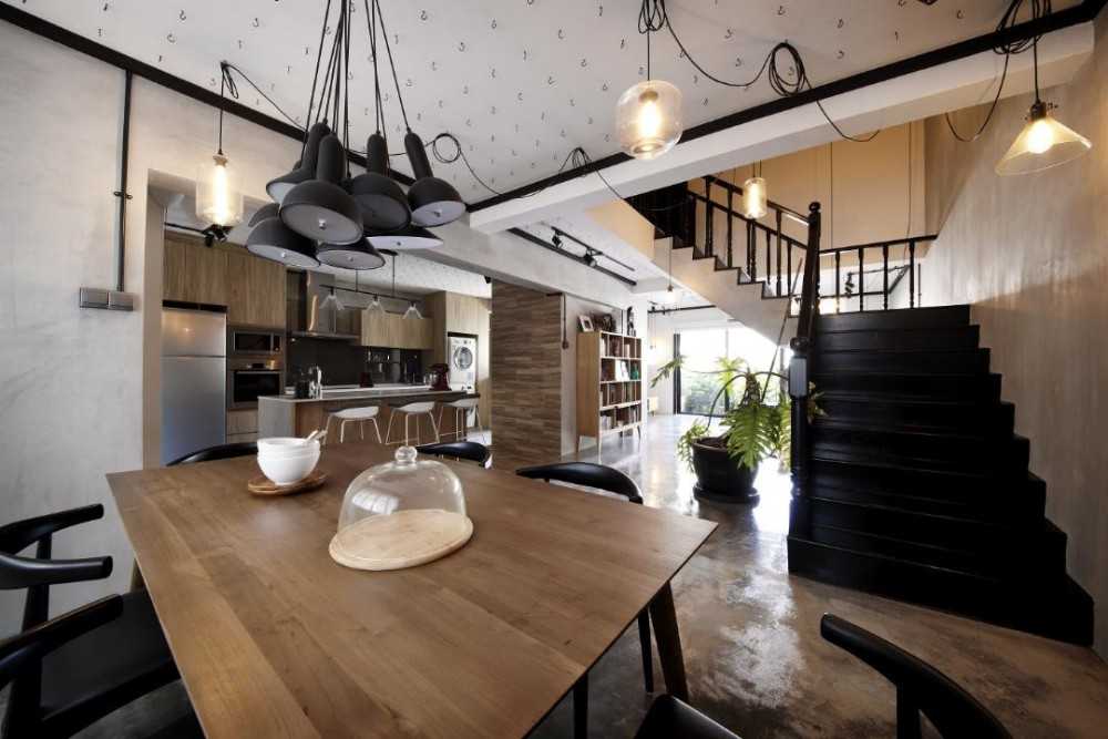 Industrial Dining Room with Staircase and Drop Ceiling