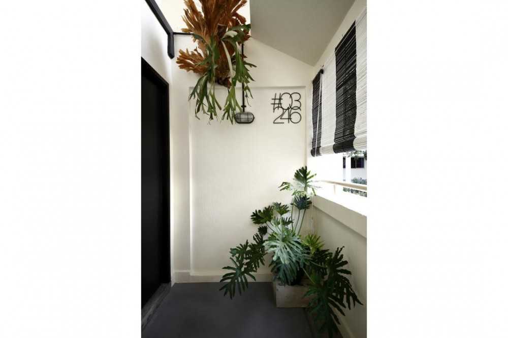 Industrial Entryway with Planters and Blinds