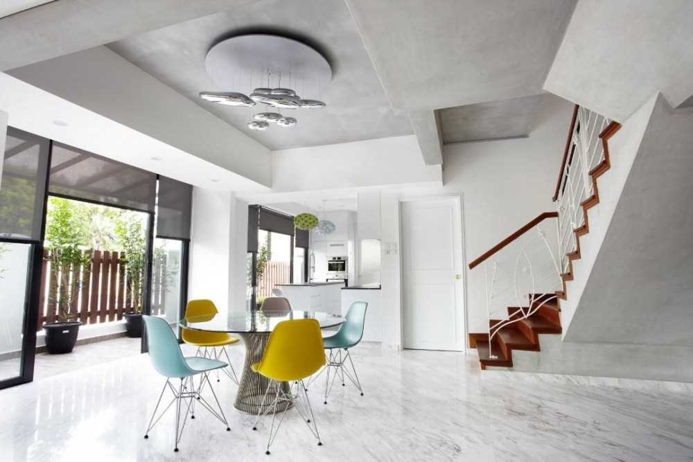 Eclectic Dining Room with Marble Floor and Staircase