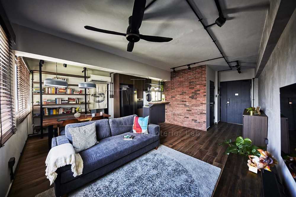 Industrial Living Room with Bookshelf and Feature Wall