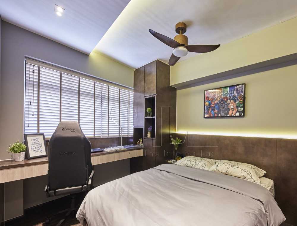 Contemporary Bedroom with Cove Lighting and Desk Chairs