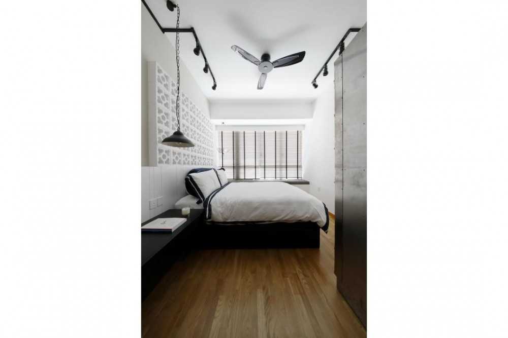 Industrial Bedroom with Wood Flooring and Queen Bed