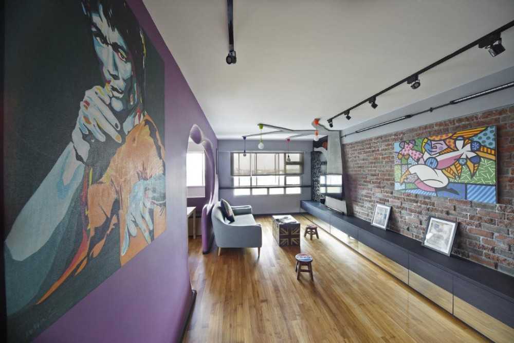Eclectic Living Room with Wood Flooring and Feature Wall