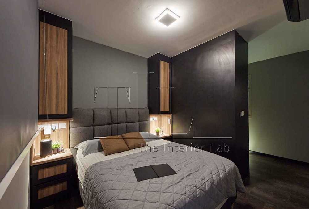 Industrial Bedroom with Wood Flooring and Bedside Table