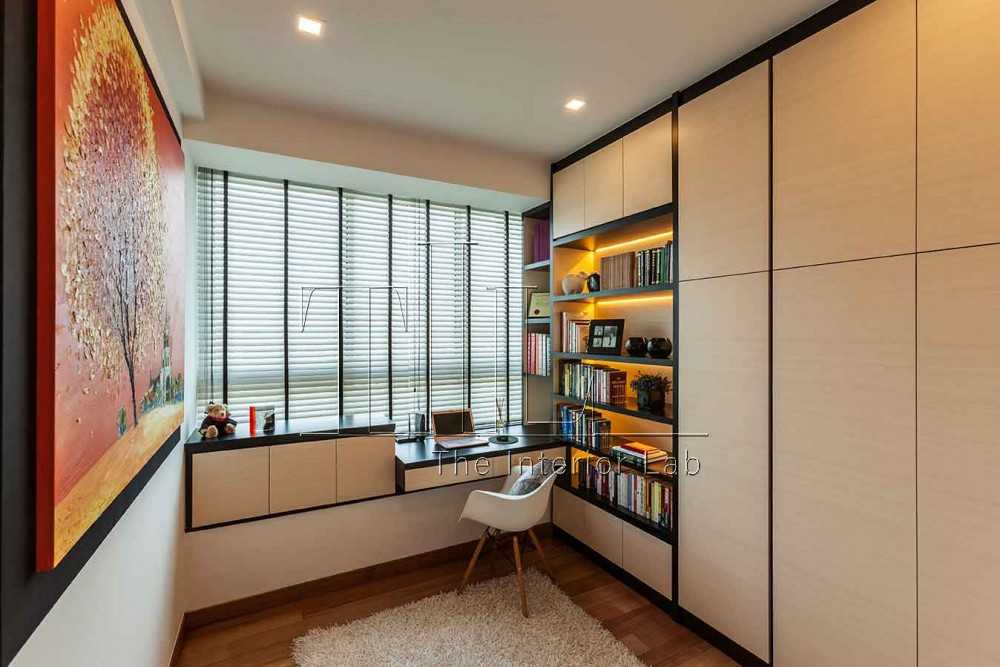 Modern Home Office with Cove Lighting and Desk Chairs