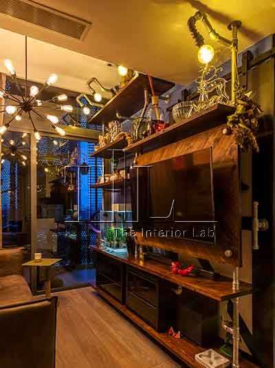 Industrial Living Room with TV Console and Feature Wall