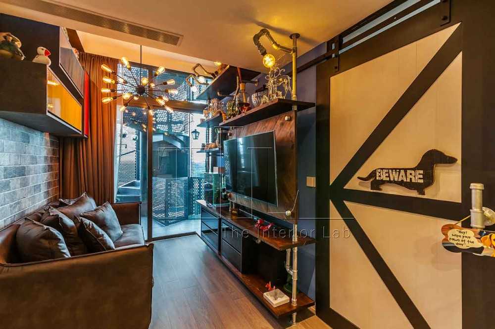 Industrial Living Room with TV Console and Artwork