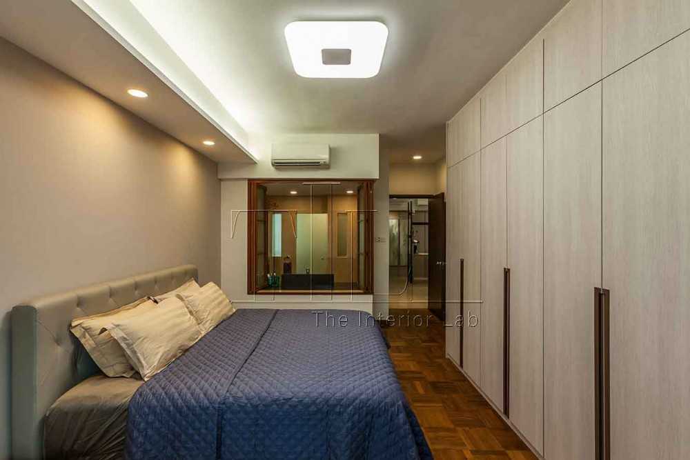 Eclectic Bedroom with Wood Flooring and Wardrobe