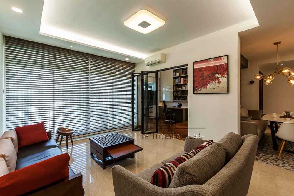 Eclectic Living Room with Cove Lighting and Artwork