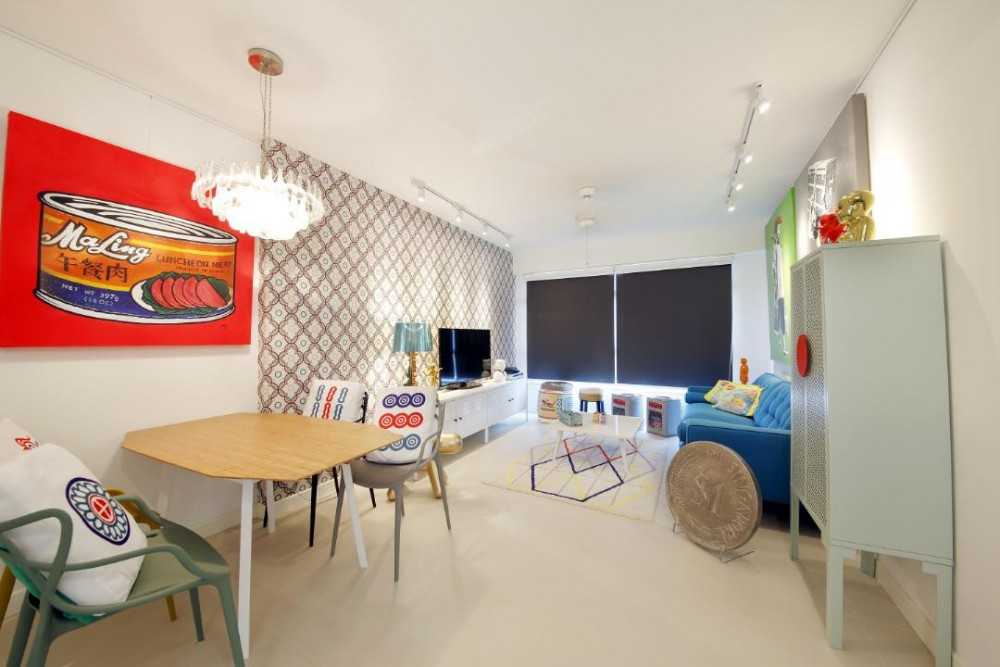 Transitional Dining Room with Feature Wall and Chandelier