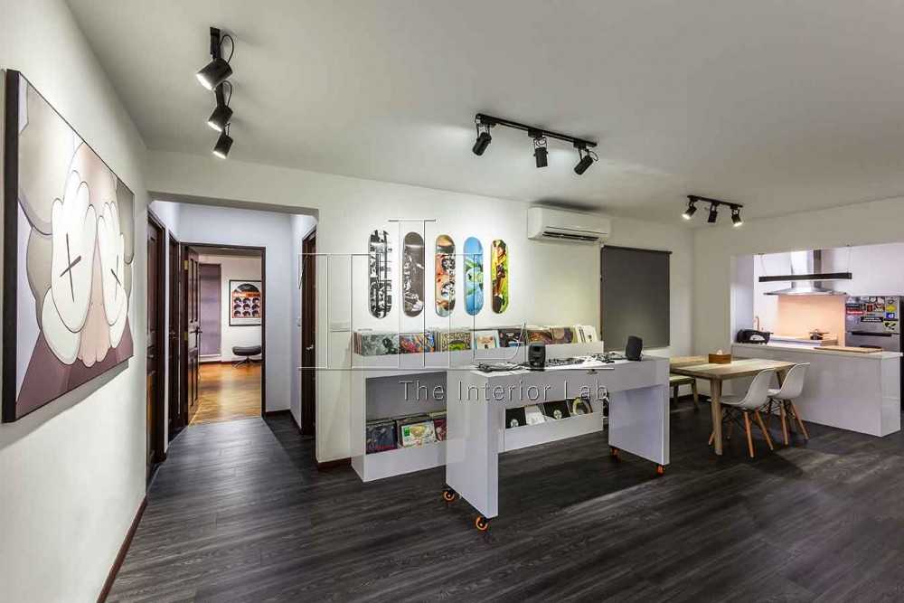 Minimalist Living Room with Artwork and Open Kitchen