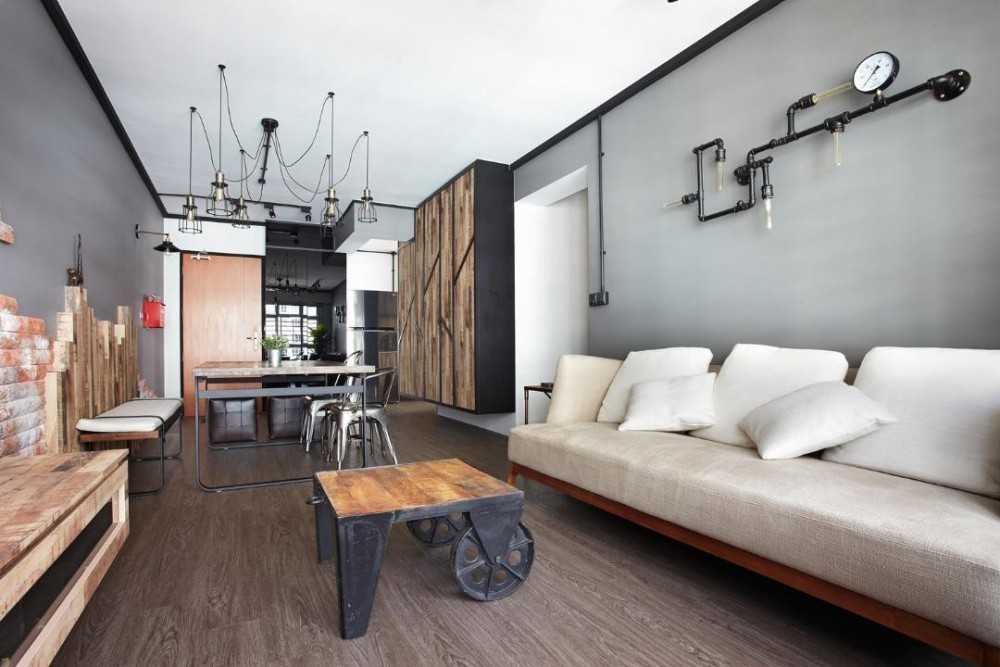 Industrial Living Room with Drop Light and Sofa