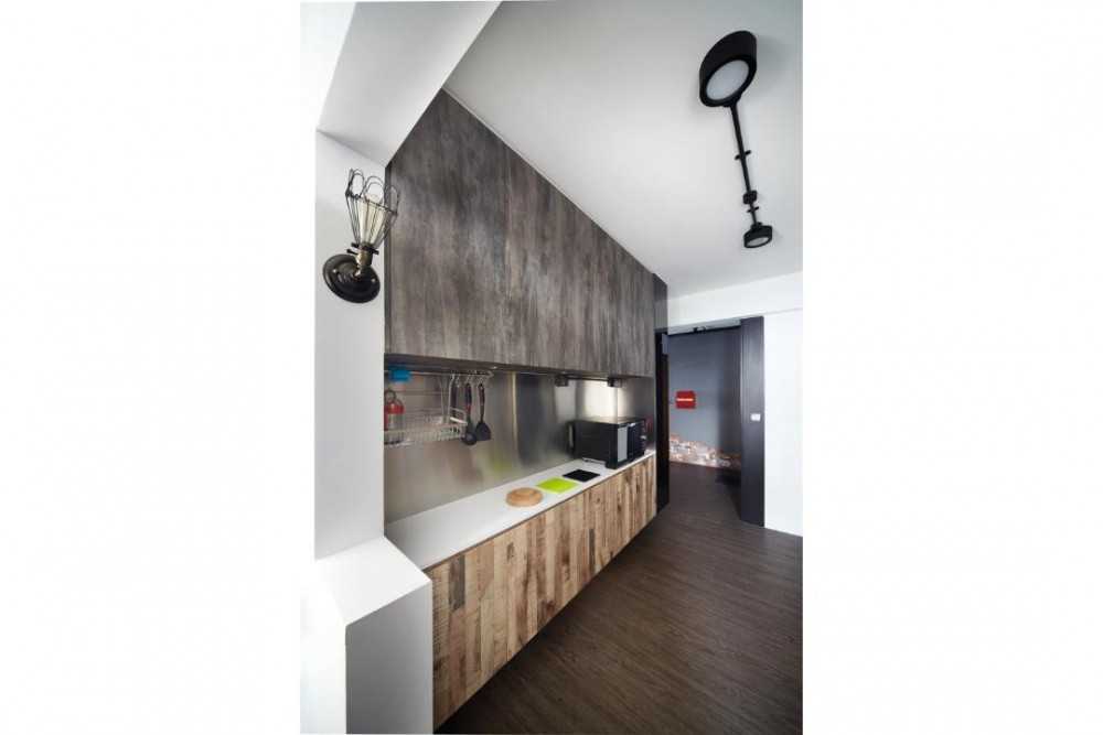 Industrial Kitchen with Kitchen Cabinets and Lighting